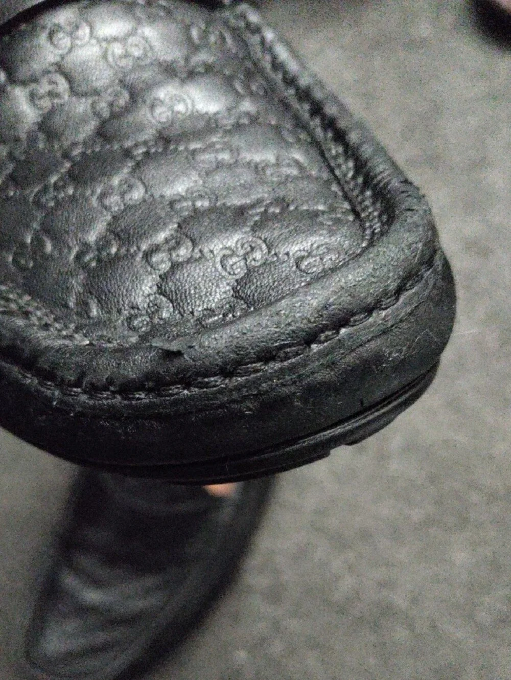 Gucci GG Black Embossed Leather Penny Loafers